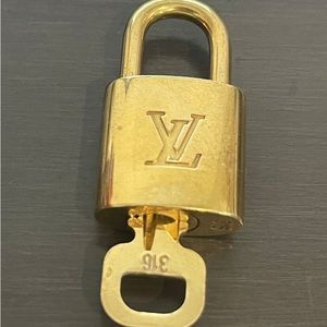 AUTHENTIC Louis Vuitton key and lock